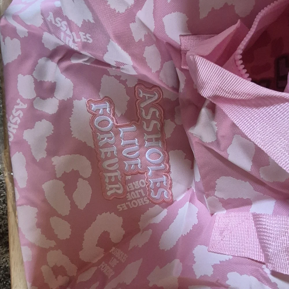 Pink Printed Garment Bag with Bold Slogan